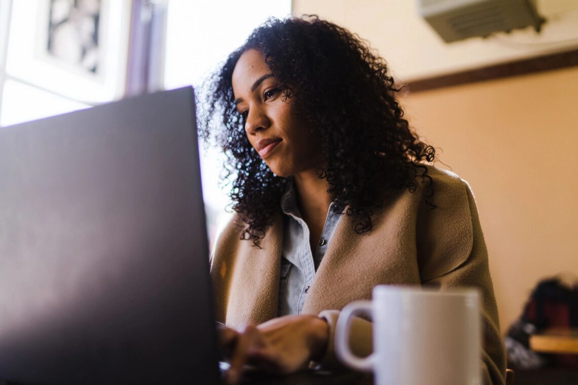 working mom at a computer